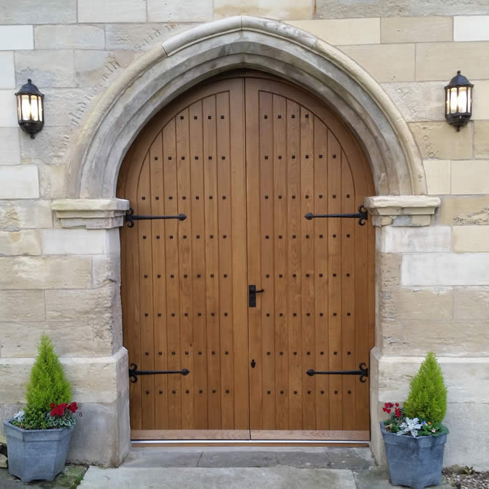 Solid Arched Church Door by Merrin Joinery